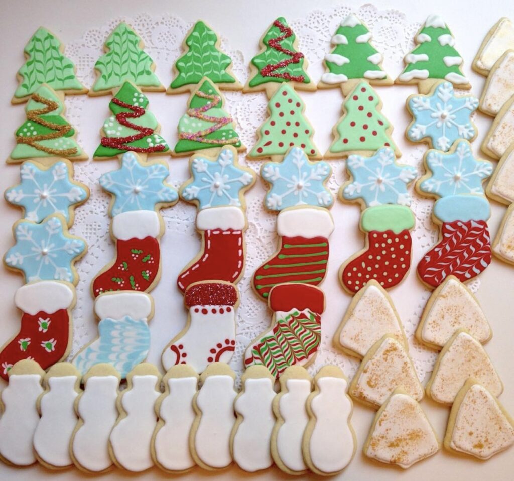 a variety of iced Christmas cookie