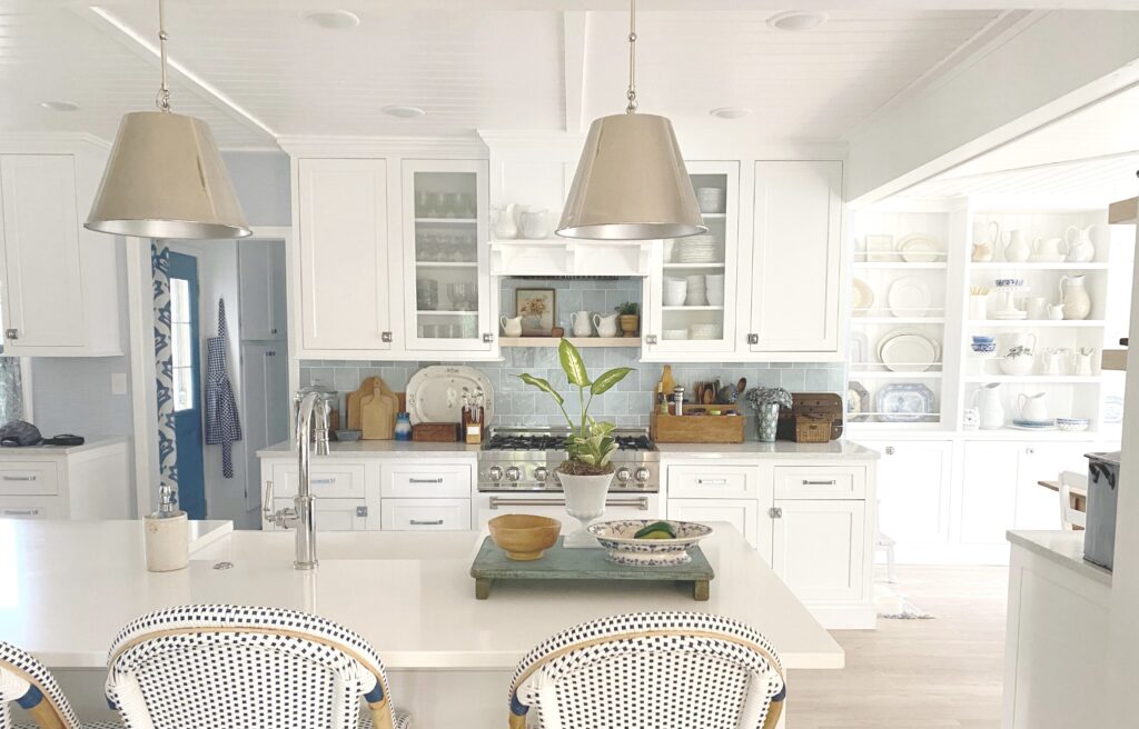 classic blue and white kitchen with beadboard paneling on ceiling