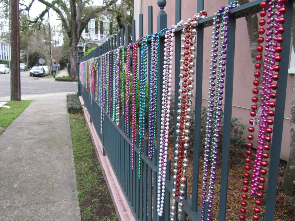 home decor beads on a fence