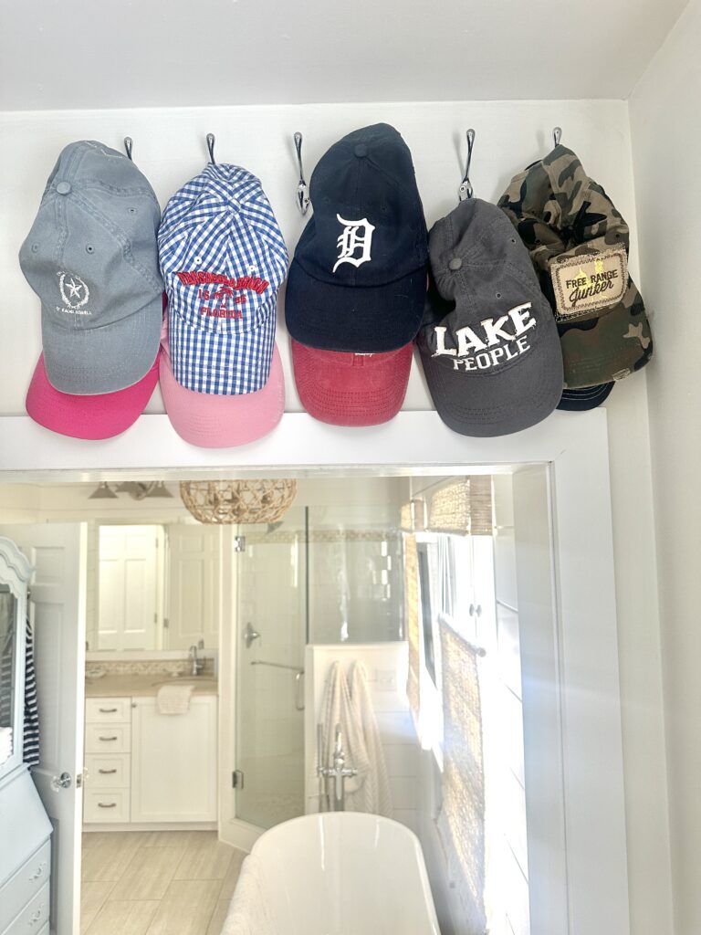 hats on hooks in closet