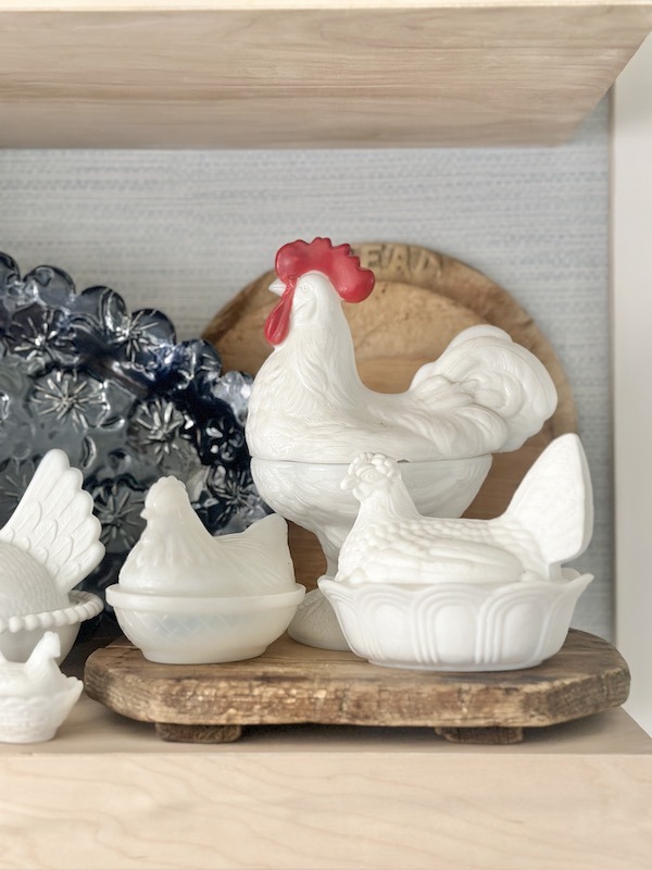 close up of milk glass hen collection