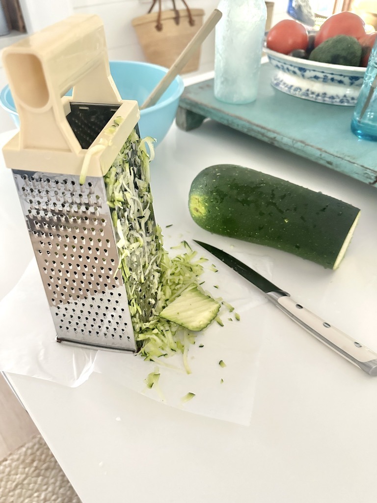 grate the zucchini with a cheese grater