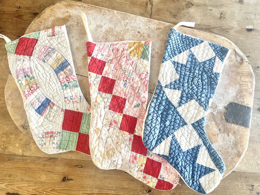 Christmas stockings made from vintage quilts