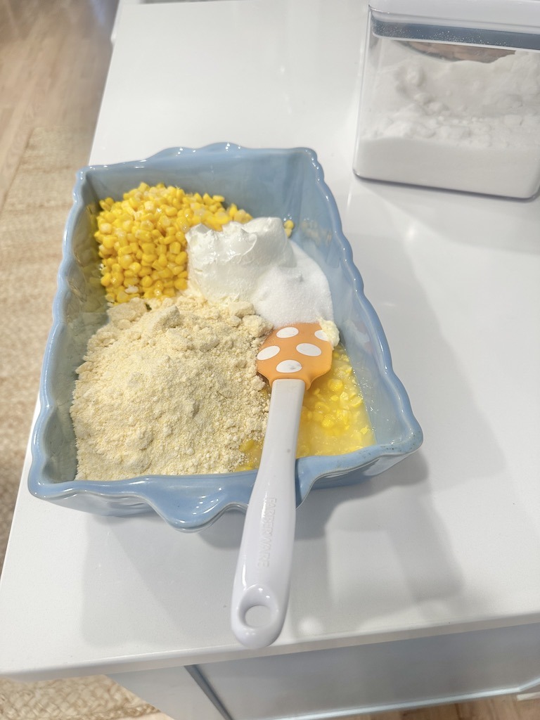 all five ingredients mixed in pan for jiffy corn casserole side dish