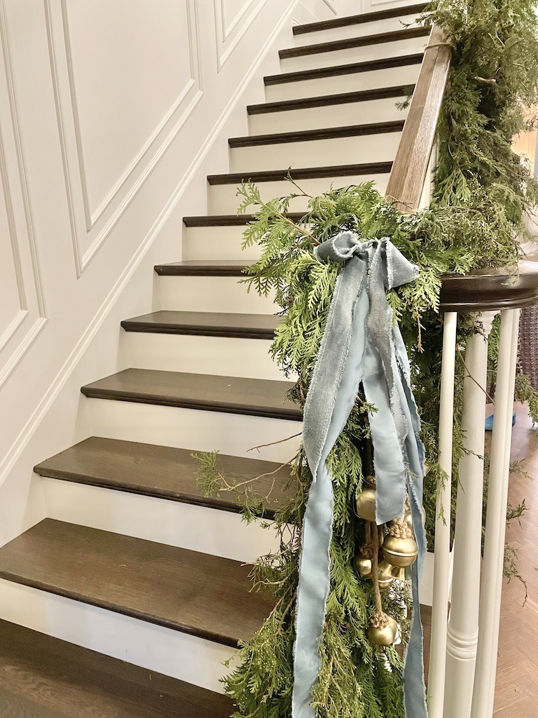 foyer and staircase with Christmas decor at Jean Stoffer Madison house
