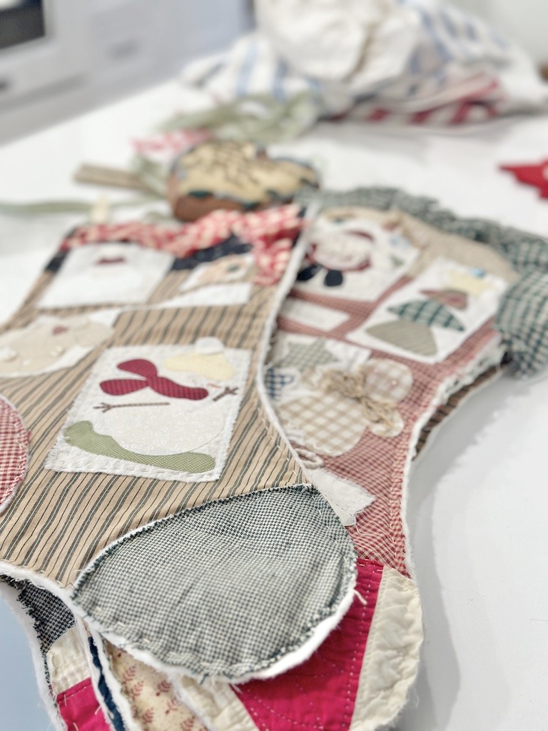 handmade Christmas stocking with vintage quilt pieces decor