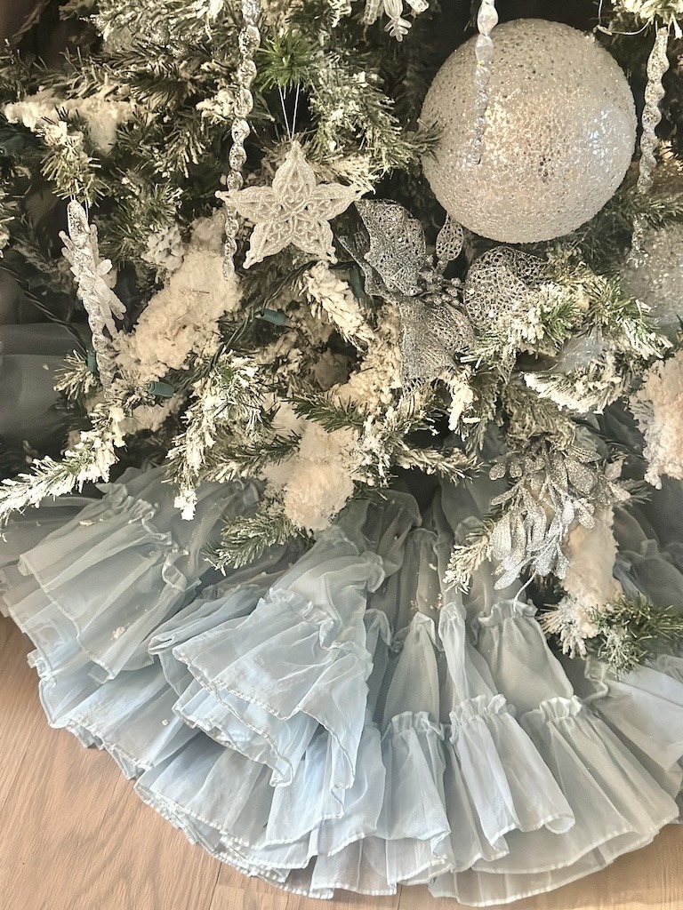 light blue crinoline ruffled slip as tree skirt as Christmas time