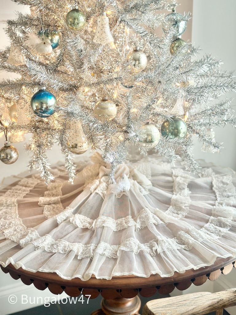 vintage lacey slip underneath a silver Christmas tree