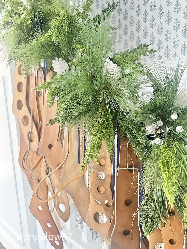 wood sock stretchers with Christmas decor