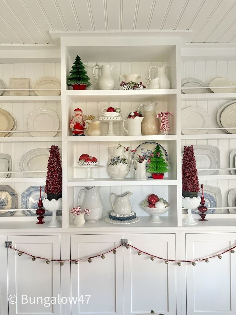 milk glass displayed with Christmas decor